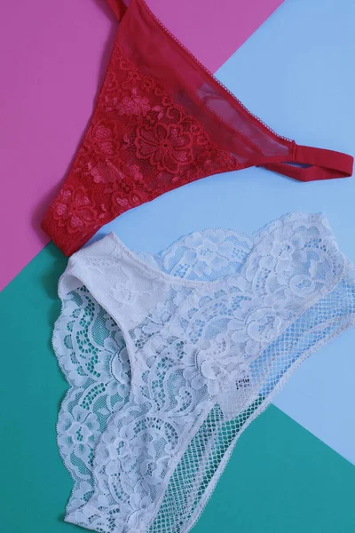 stock-photo-female-underwear-pink-background